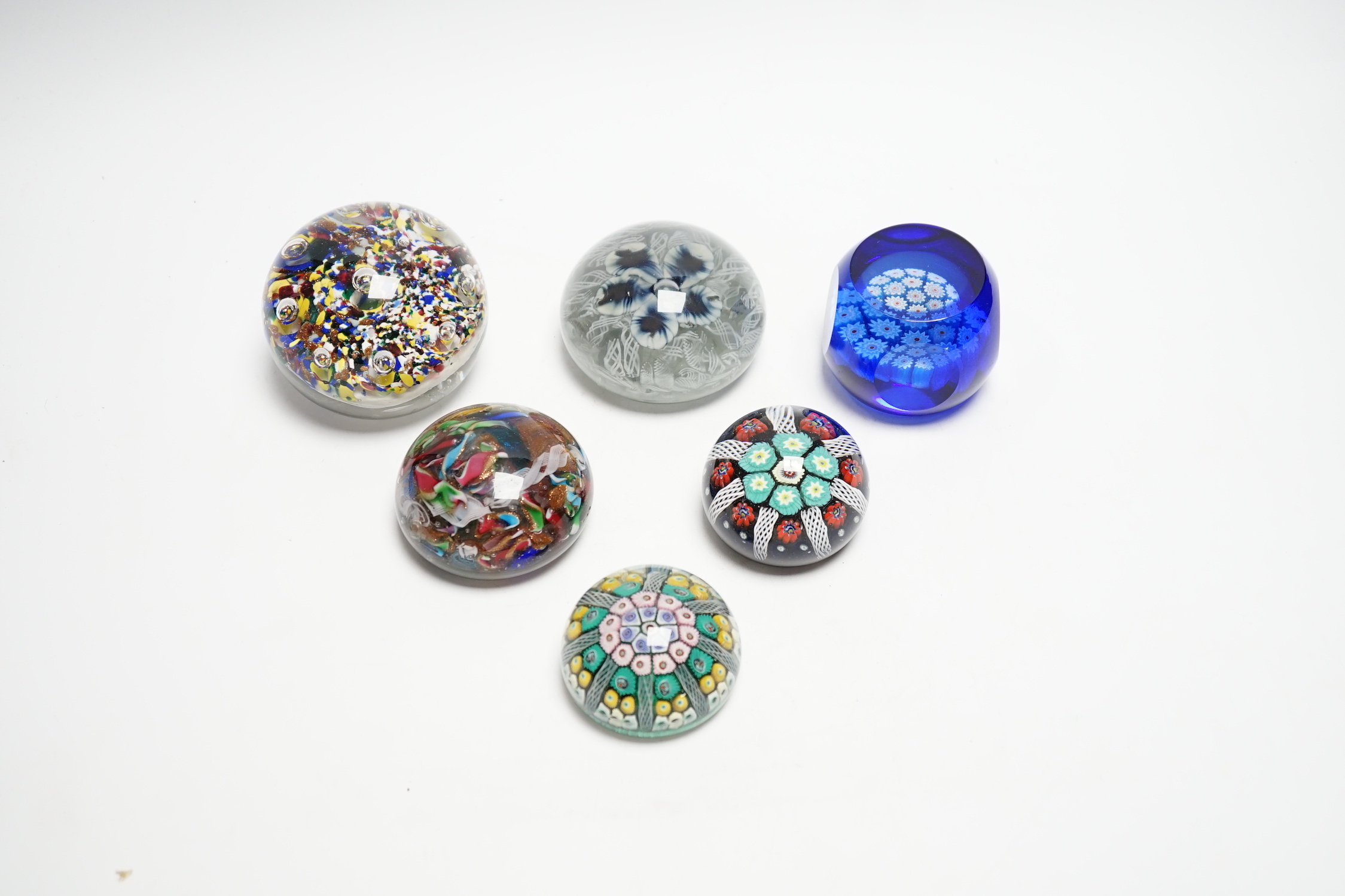 Six 20th century paperweights